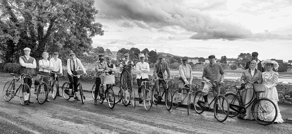 DCC club members re-enacting the first ever cycle race in Ireland